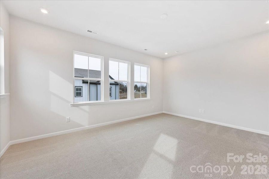 Primary Bedroom with End Unit Windows Primary Bedroom with End Unit Windows