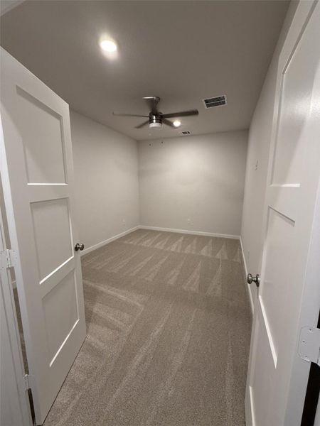 Media room strategically located away from the family room.