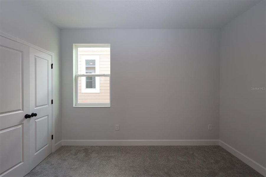 Spacious, unfurnished interior of a new home in Lake Star at Ovation, Winter Garden (Image 24).