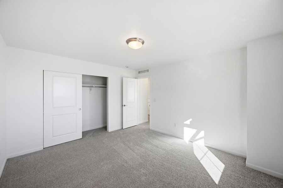 Spacious, unfurnished interior of a new home in Trailstone, Arvada (Image 28).