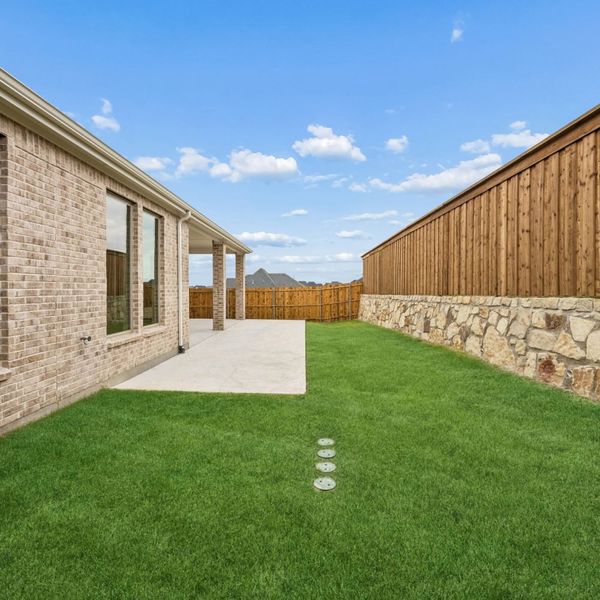 Exterior details and patio area of a home in Mustang Lakes, Celina (Image 29).