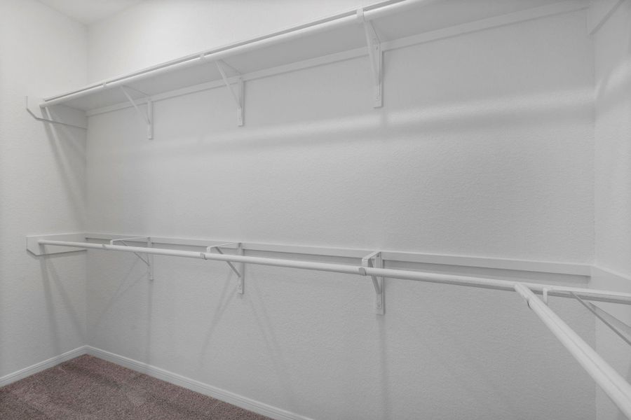 A view of your large primary walk-in Closet A view of your large primary walk-in Closet