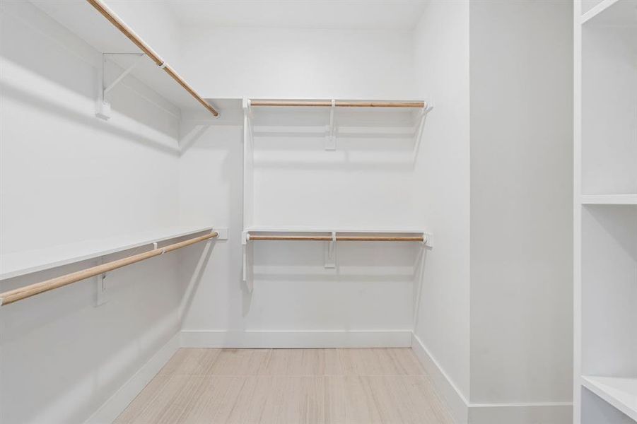 Walk in closet and shelving.