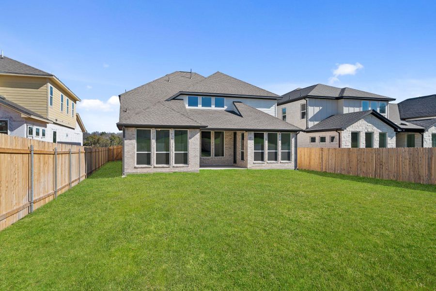 Rear of Home and Private Backyard