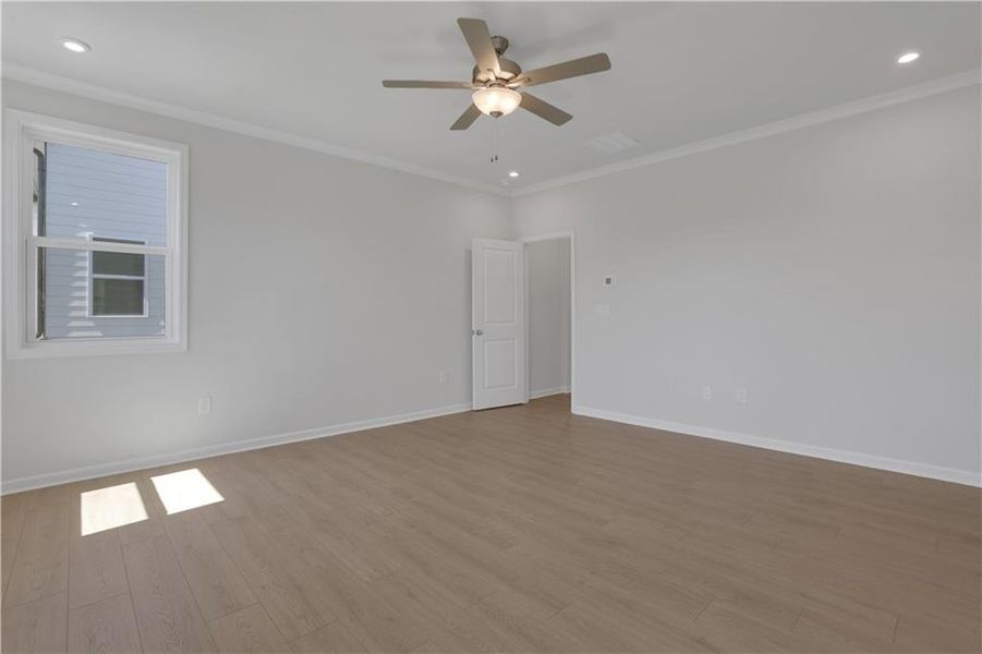 Spacious, unfurnished interior of a new home in The Paddocks at Doc Hughes, Buford (Image 23).