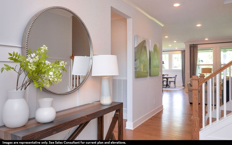 Furnished interior view inside a new home in Aden Woods, Fairview (Image 4).