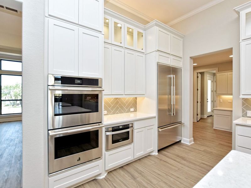 Representative furnished interior of a home built from the Avalon by Giddens Homes in Scofield Farms Estates, Georgetown (Image 107).