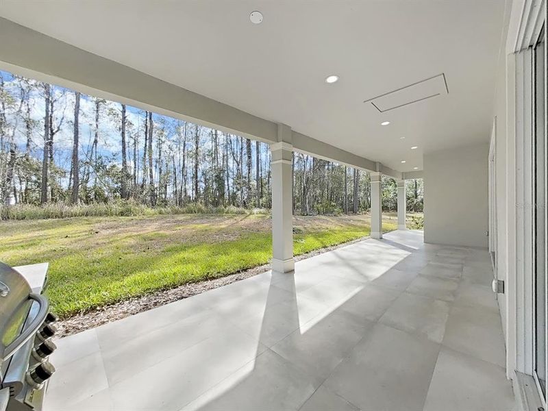 Exterior details and patio area of a home in , Brooksville (Image 3).