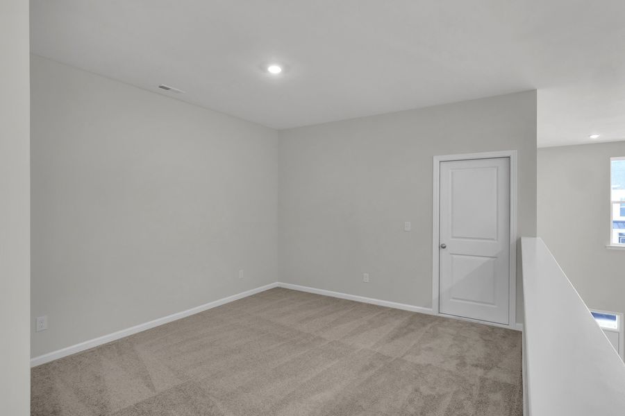 Spacious, unfurnished interior of a new home in Grand Park, Leland (Image 29). Spacious, unfurnished interior of a new home in Grand Park, Leland (Image 29).