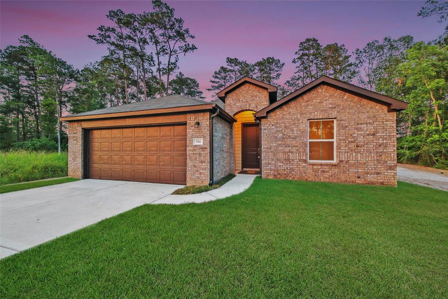 Front exterior of a new home in , New Caney, TX, highlighting curb appeal (Image 13).