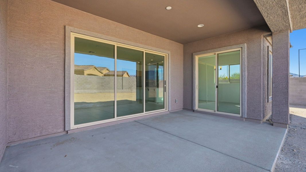Exterior details and patio area of a home in Arroyo Seco - Palazzo, Buckeye (Image 3).
