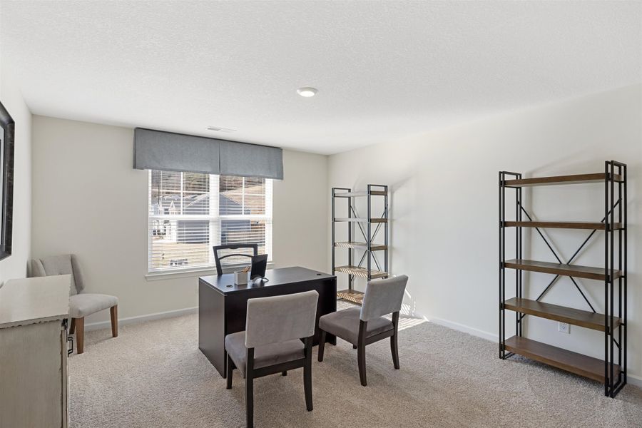 Representative furnished interior of a home built from the Hanover by D.R. Horton in Hillcrest Landing, McDonald (Image 15).