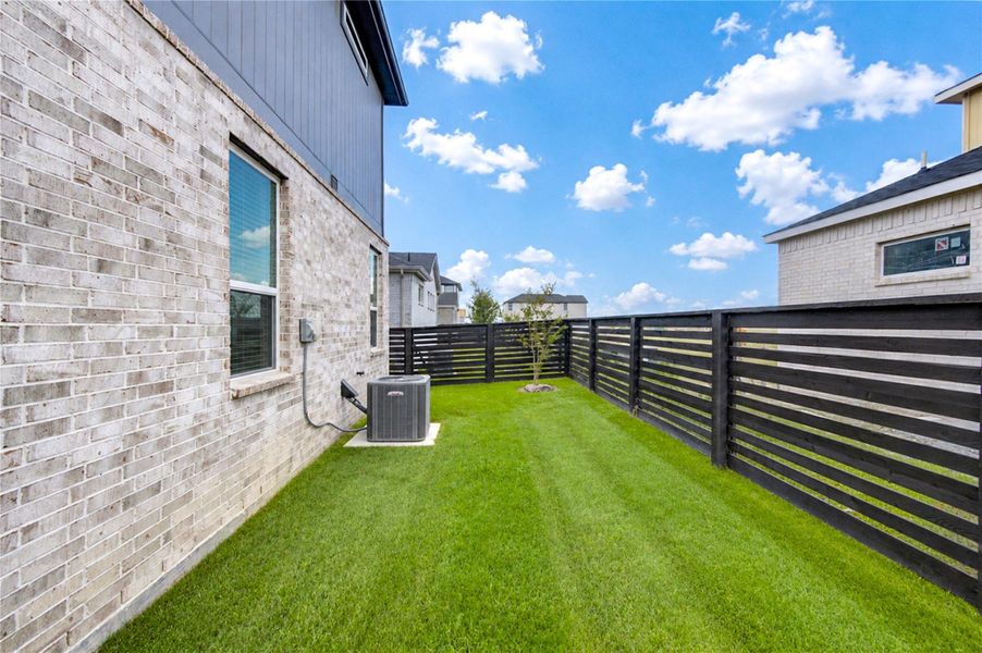 Exterior details and patio area of a home in Easthaven at Bridgeland Central, Cypress (Image 3).