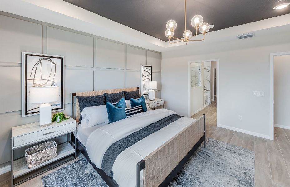 Representative furnished interior of a home built from the Livingston Grande by DiVosta in Bridgewater, Jupiter (Image 32).