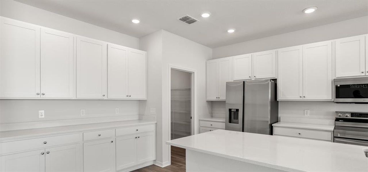 Furnished interior view inside a new home in The Crossings - Single-Family Homes, St. Cloud (Image 9).