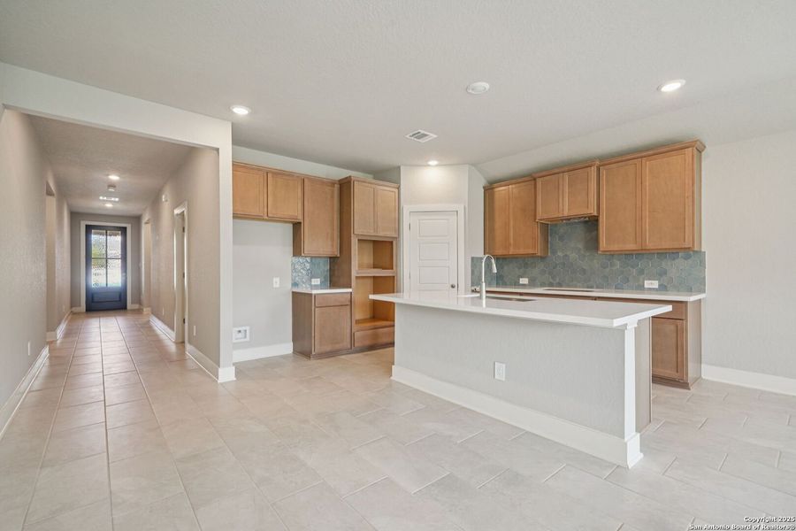 Furnished interior view inside a new home in Estancia Ranch - Classic Series, San Antonio (Image 9).