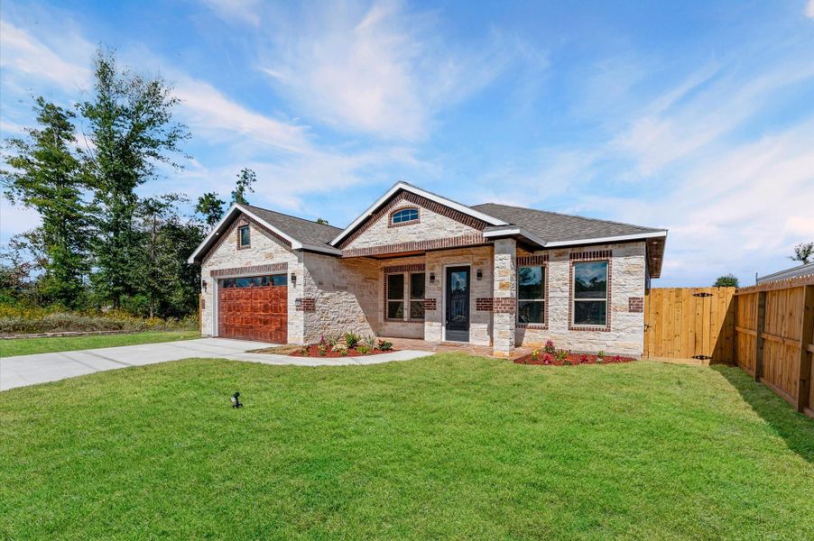 Stunning curb appeal with a custom stone-and-brick exterior and beautiful architectural design. Stunning curb appeal with a custom stone-and-brick exterior and beautiful architectural design.