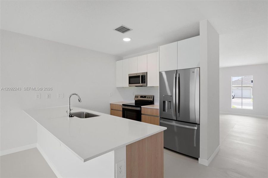 Furnished interior view inside a new home in , Miami (Image 9). Furnished interior view inside a new home in , Miami (Image 9).