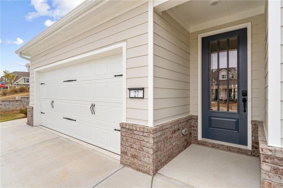 Exterior details and patio area of a home in Heritage Pointe at The Georgian, Villa Rica (Image 2). Exterior details and patio area of a home in Heritage Pointe at The Georgian, Villa Rica (Image 2).