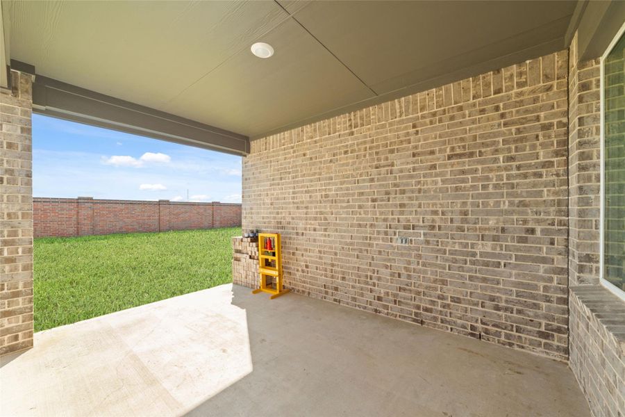 Huge back covered patio