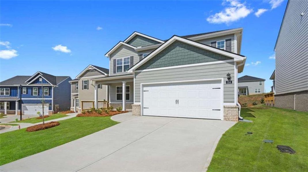 Front exterior of a new home in Twin Lakes, Hoschton, GA, highlighting curb appeal (Image 2).
