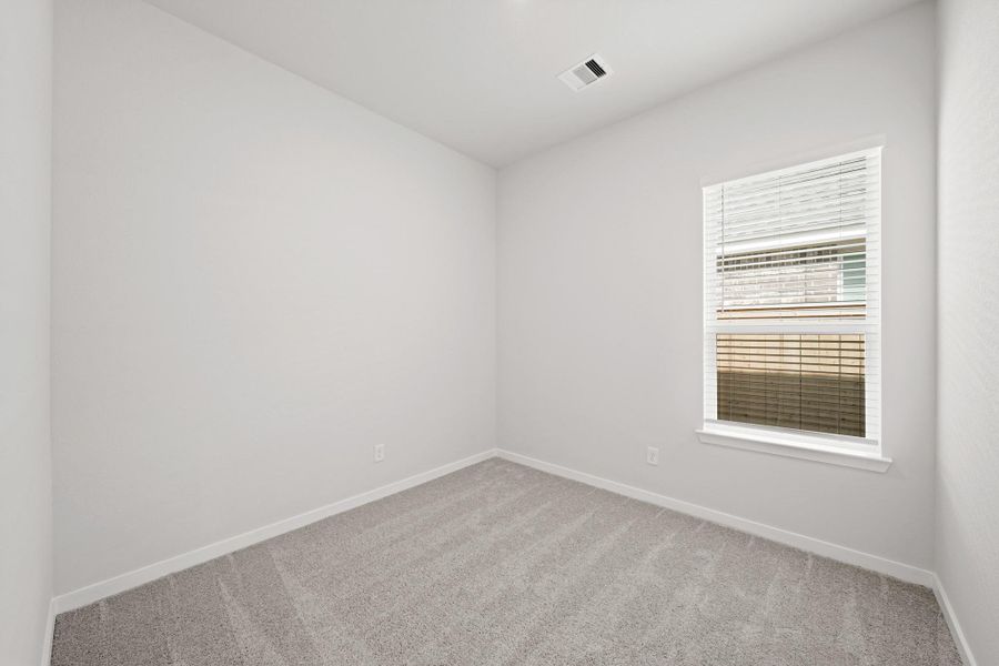 Spacious, unfurnished interior of a new home in Creekland Village at Bridgeland, Cypress (Image 16).