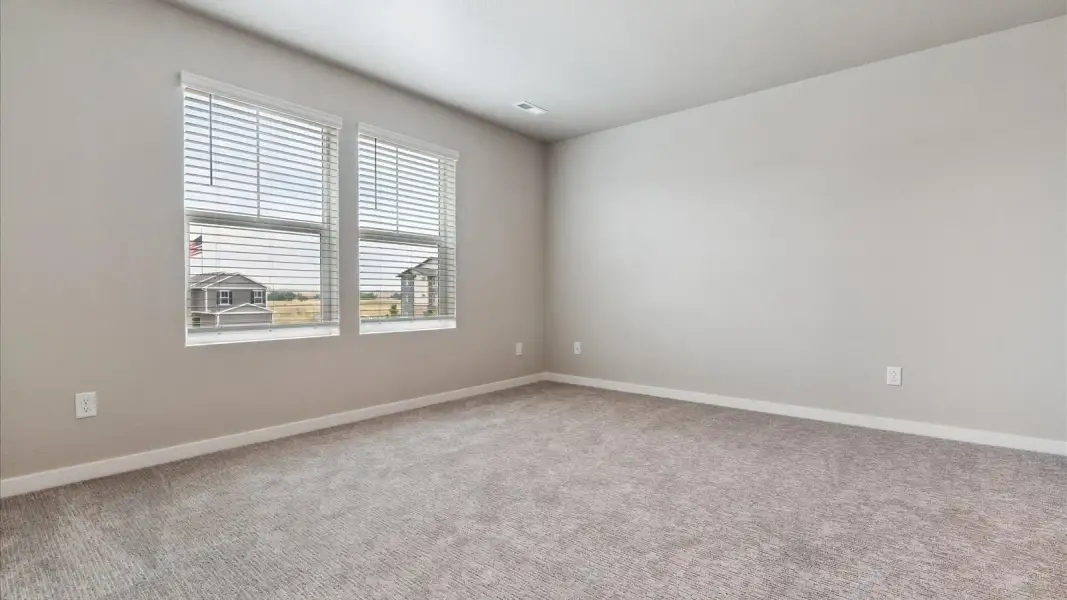 Spacious, unfurnished interior of a new home in Sky Ranch, Watkins (Image 14).