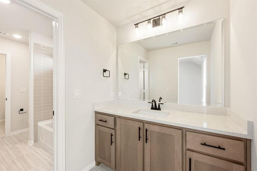 Furnished interior view inside a new home in Woodstone, Providence Village (Image 9).
