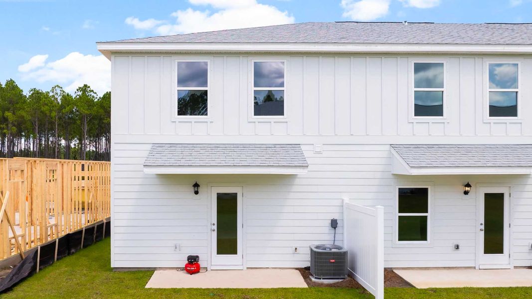 Exterior details and patio area of a home in Bayside at Ward Creek, Panama City Beach (Image 2).
