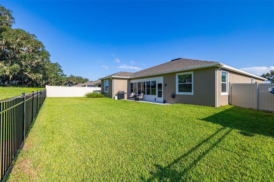 Exterior details and patio area of a home in Farm at Varrea, Plant City (Image 28). Exterior details and patio area of a home in Farm at Varrea, Plant City (Image 28).