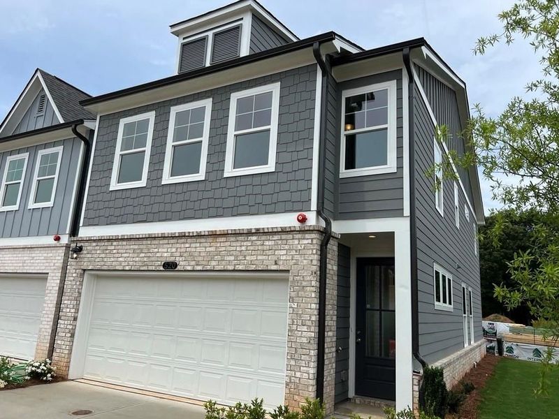 Front exterior of a new home in Rosehill Townhomes, Marietta, GA, highlighting curb appeal (Image 7).