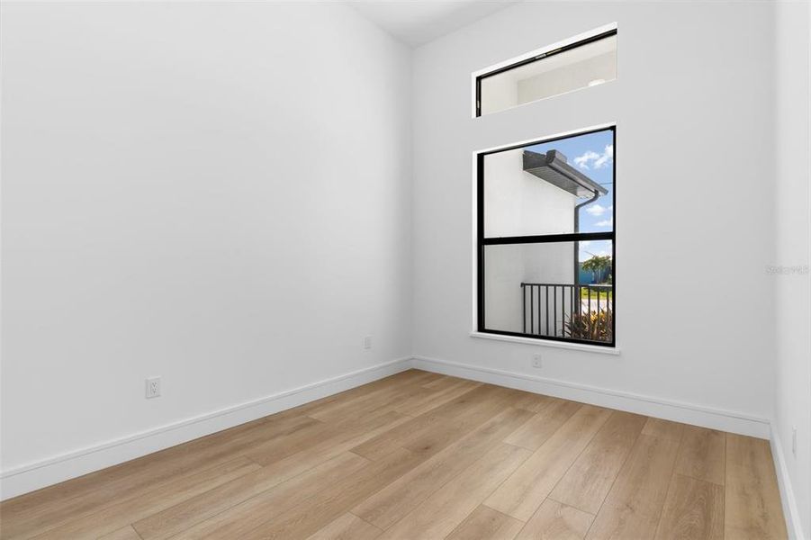 Spacious, unfurnished interior of a new home in , Port Charlotte (Image 29).