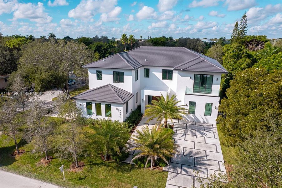 Front exterior of a new home in , Pinecrest, FL, highlighting curb appeal (Image 30).