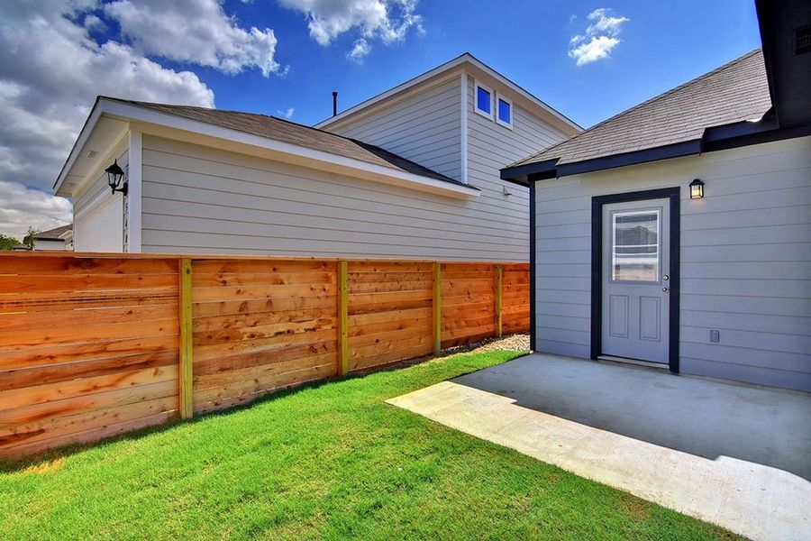 Representative exterior photo of a completed home built from the Bach by Taylor Morrison in Emory Crossing 40s, Hutto, TX (Image 16). Representative exterior photo of a completed home built from the Bach by Taylor Morrison in Emory Crossing 40s, Hutto, TX (Image 16).