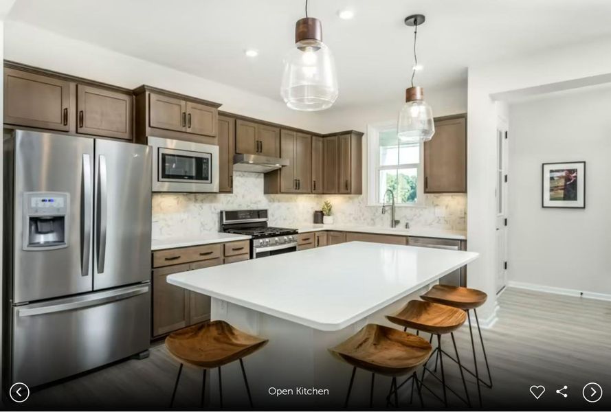 Interior photos- Photo of Pulte model home with same floor plan, not of actual home listed.