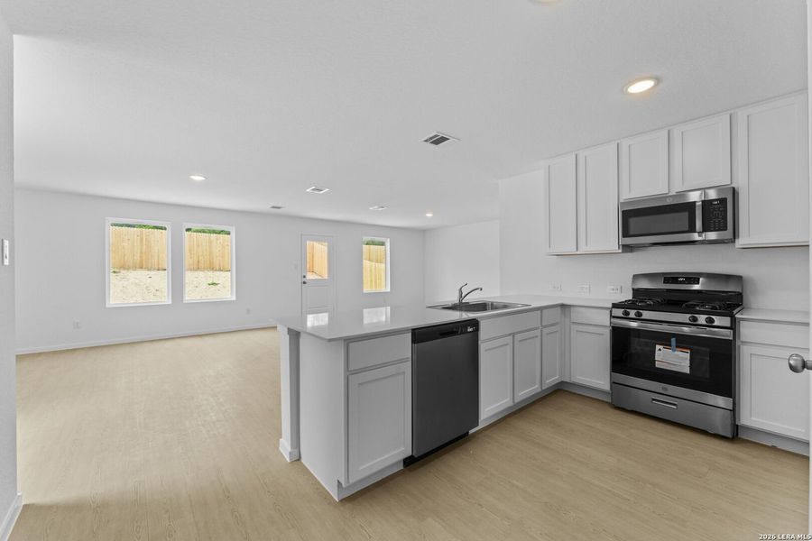 Furnished interior view inside a new home in Waterwheel, San Antonio (Image 7).