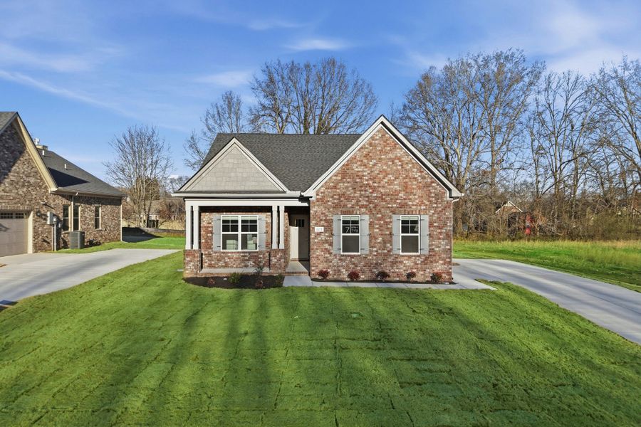 Front exterior of a new home in Sagewood, Tullahoma, TN, highlighting curb appeal (Image 21).