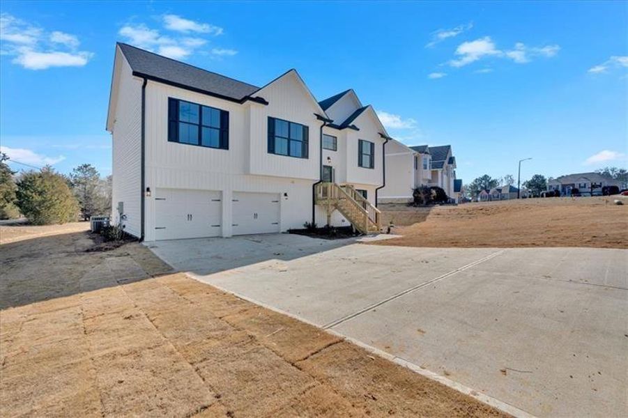 Front exterior of a new home in , Rome, GA, highlighting curb appeal (Image 22). Front exterior of a new home in , Rome, GA, highlighting curb appeal (Image 22).