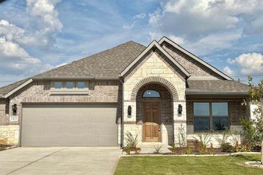 Front exterior of a new home in , Venus, TX, highlighting curb appeal (Image 1). Front exterior of a new home in , Venus, TX, highlighting curb appeal (Image 1).