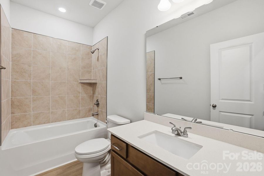 Furnished interior view inside a new home in Sloan Station, Charlotte (Image 10).