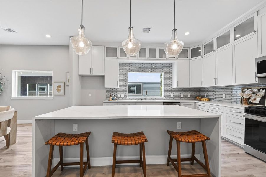 Shaker style cabinetry with subway tile Shaker style cabinetry with subway tile