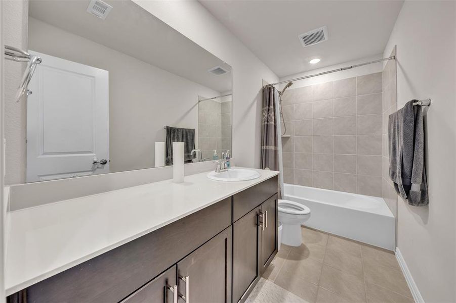 Furnished interior view inside a new home in Briarwood Hills - Highland Series, Forney (Image 9). Furnished interior view inside a new home in Briarwood Hills - Highland Series, Forney (Image 9).