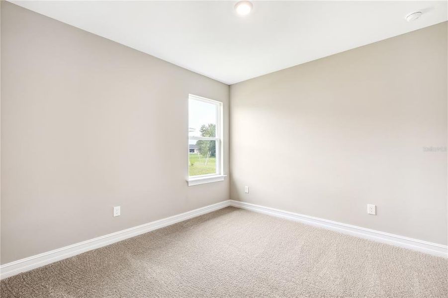 Spacious, unfurnished interior of a new home in Burnt Store Village, Punta Gorda (Image 15).