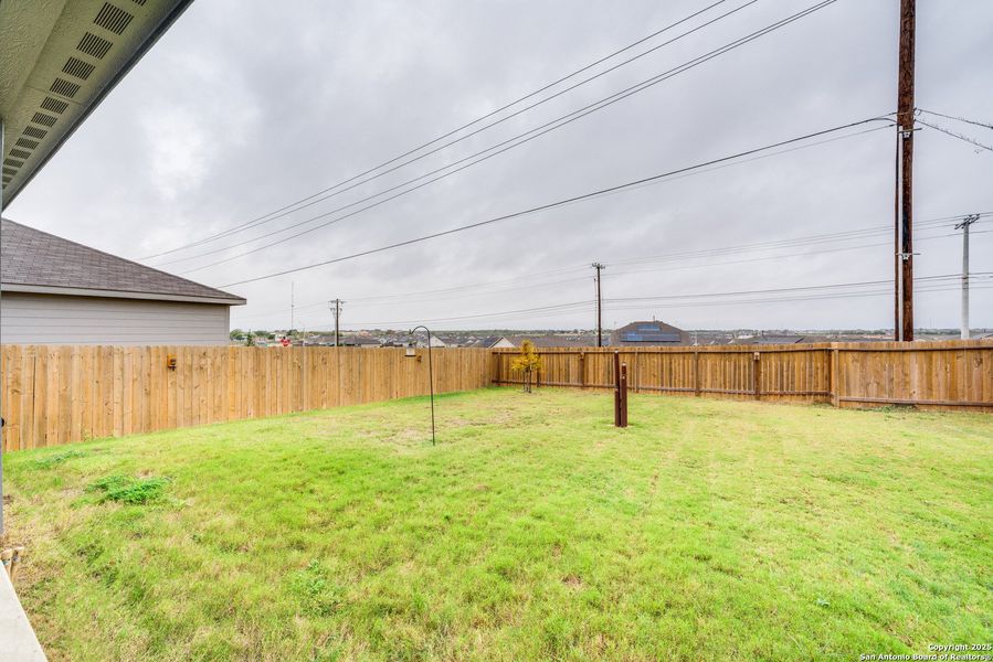 Exterior details and patio area of a home in Legend Pond, New Braunfels (Image 26).