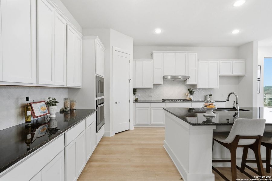 Furnished interior view inside a new home in Kinder Ranch - 70', San Antonio (Image 8).