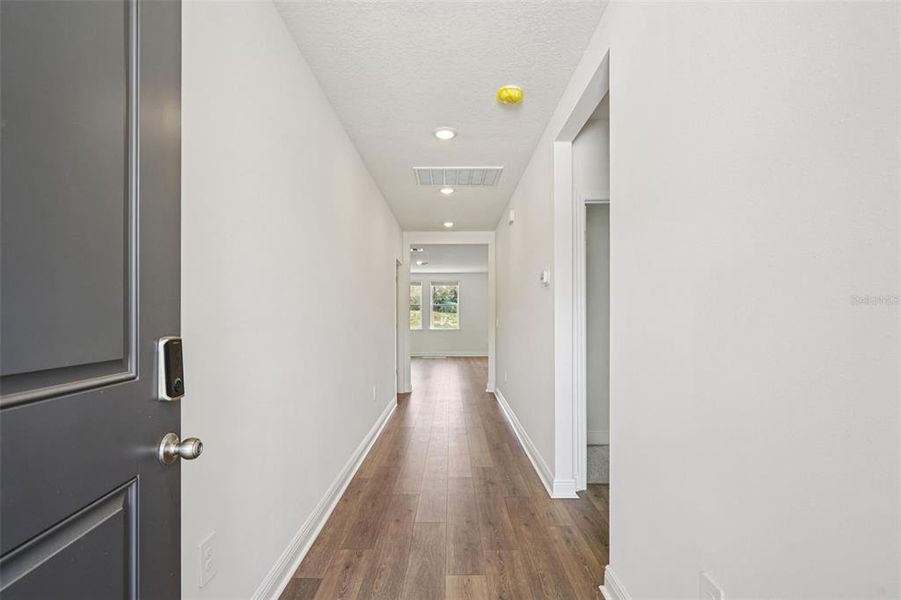 Spacious, unfurnished interior of a new home in The Reserve at Hammock Oaks - Signature Series, Lady Lake (Image 26).