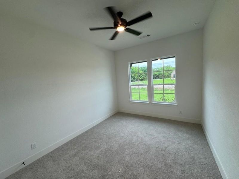 Spacious, unfurnished interior of a new home in King Crossing Estates, Van Alstyne (Image 14).