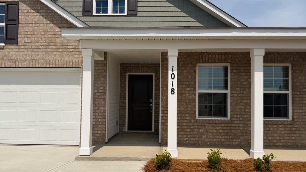 Exterior details and patio area of a home in Gates Village, Lugoff (Image 3).