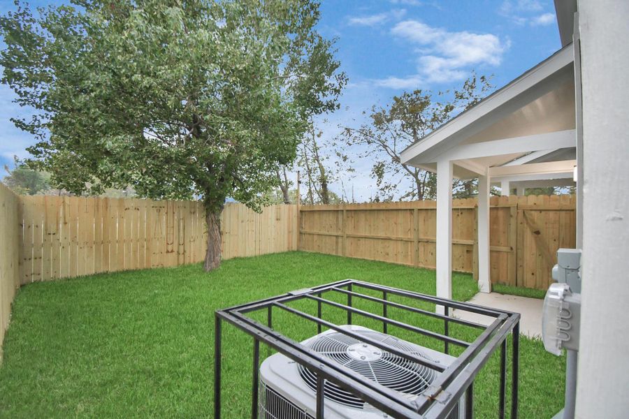 Exterior details and patio area of a home in , Houston (Image 3). Exterior details and patio area of a home in , Houston (Image 3).