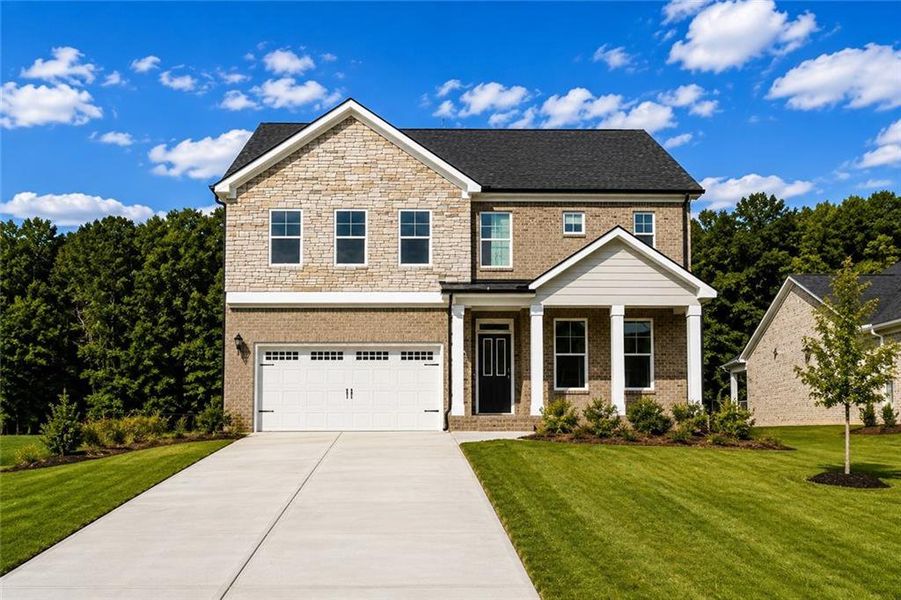 Front exterior of a new home in Westland, Bogart, GA, highlighting curb appeal (Image 2). Front exterior of a new home in Westland, Bogart, GA, highlighting curb appeal (Image 2).